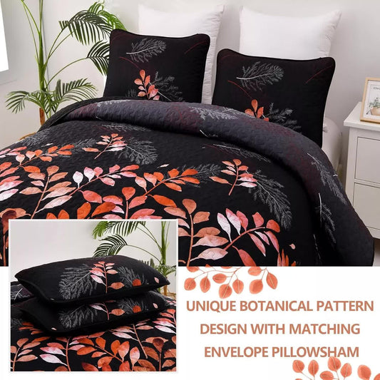 Black quilted bedspread with botanical leaf print and two matching square pillow covers
