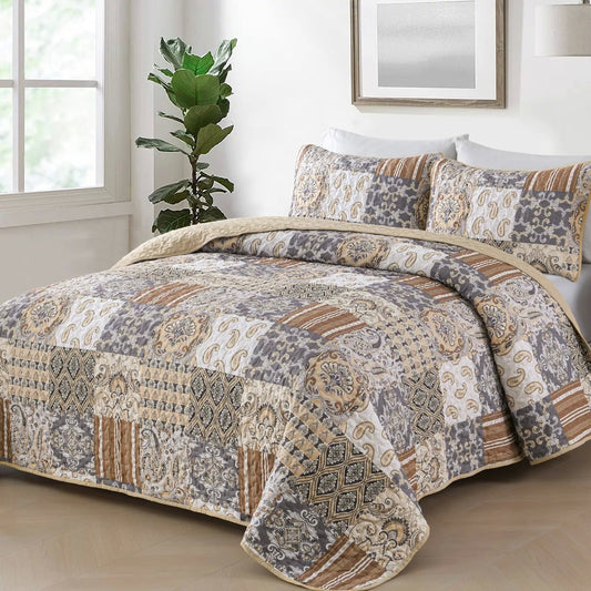 Quilted coverlet and pillow cover set with paisley and striped blocks in blue-gray, tan.