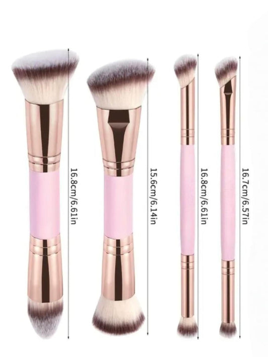 Makeup brush set with four pink brushes, gold ferrules, and soft white bristles