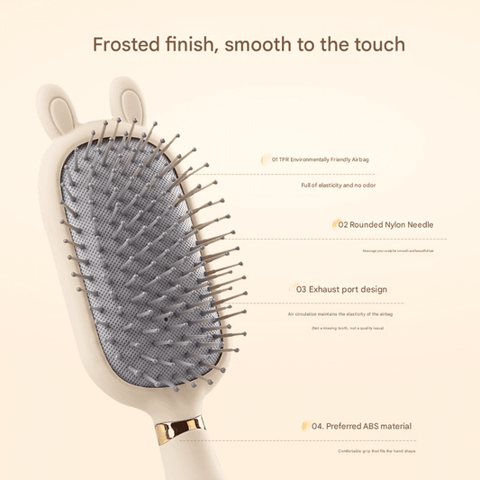 Oval air cushion hair brush with gray cushion and metal pins, frosted white handle