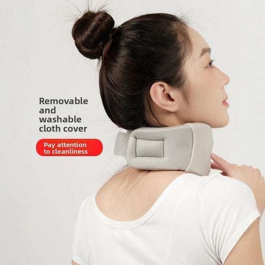 Light gray neck posture collar with removable cover, worn snug around neck