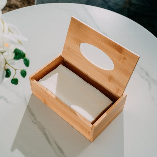 Open bamboo tissue box with oval cutout window and tissue-ready inner tray