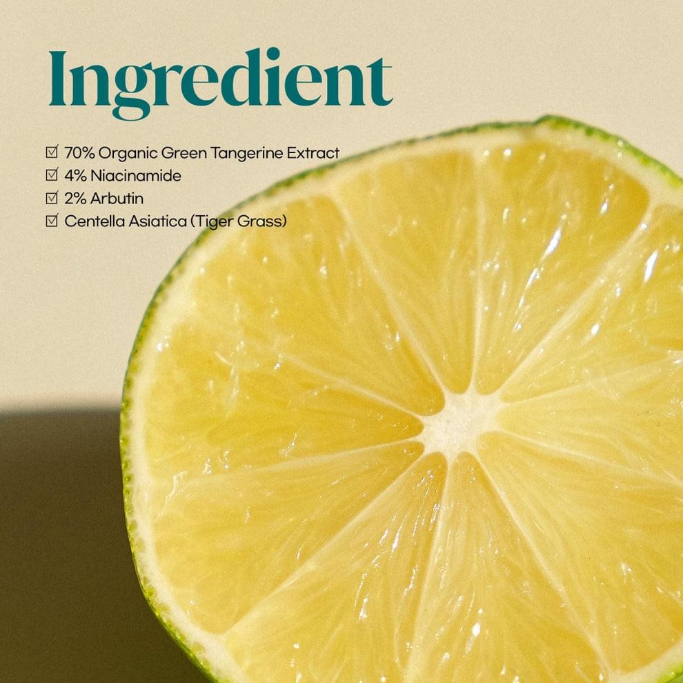 Sliced green tangerine fruit with segmented interior for dark spot care