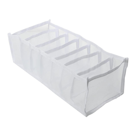 Foldable clothes organizer drawer with grid dividers and light beige side panels.