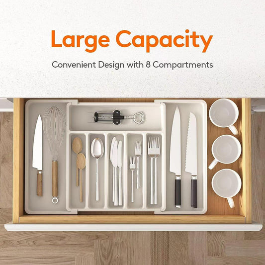 White adjustable cutlery tray with multiple compartments for utensils