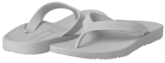 White Archline orthotic flip-flops, side view with contoured sole and thong strap