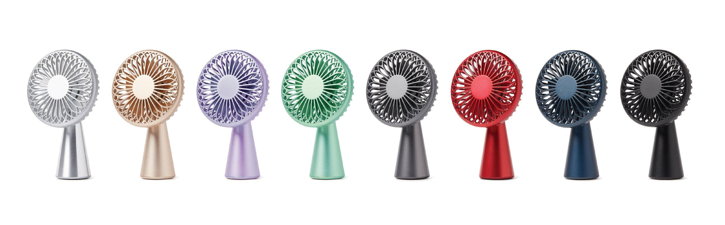 Assorted-color mini portable fan collection with round mesh grilles.