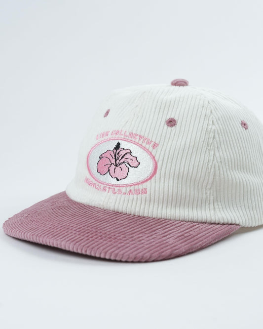 Flower Madness cap, ribbed cream crown with mauve underside brim and pink flower logo