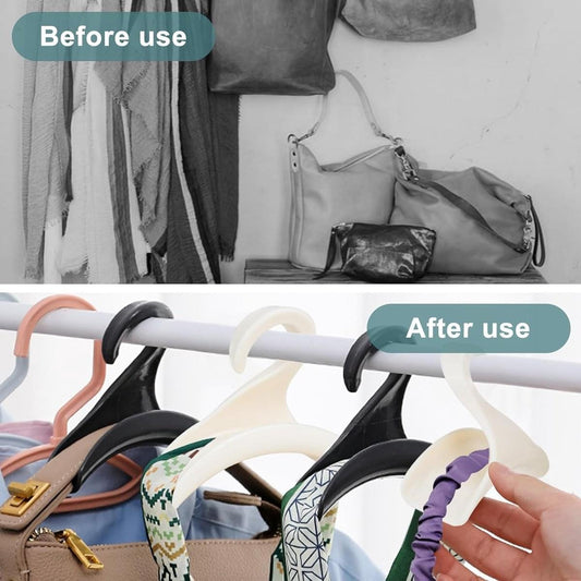 Bag hanger hooks on a bar, black and white curved hangers with hand