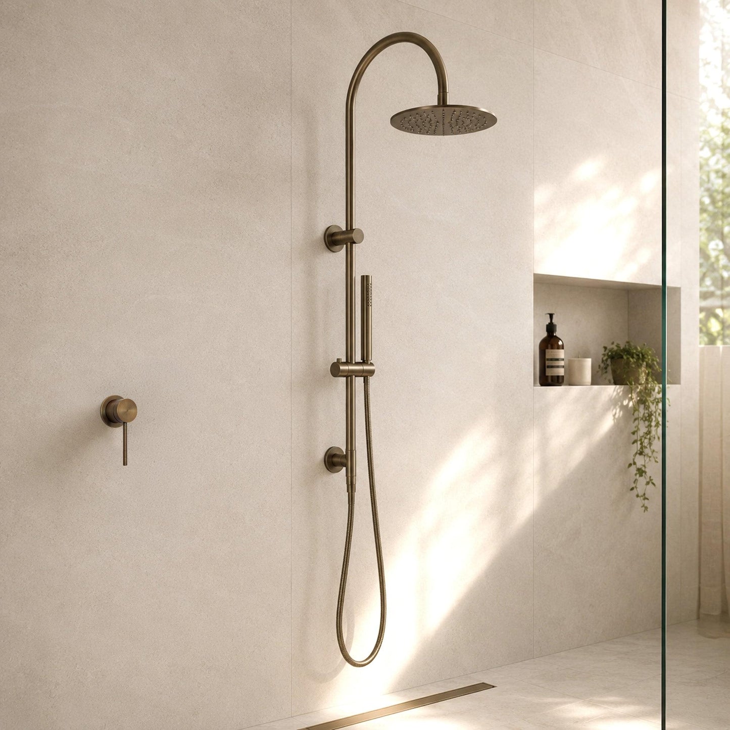Antique brass shower mixer with lever control and overhead shower head assembly.