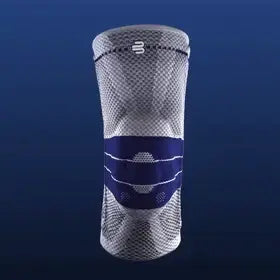 Gray and blue knee support sleeve with compression band, closed view