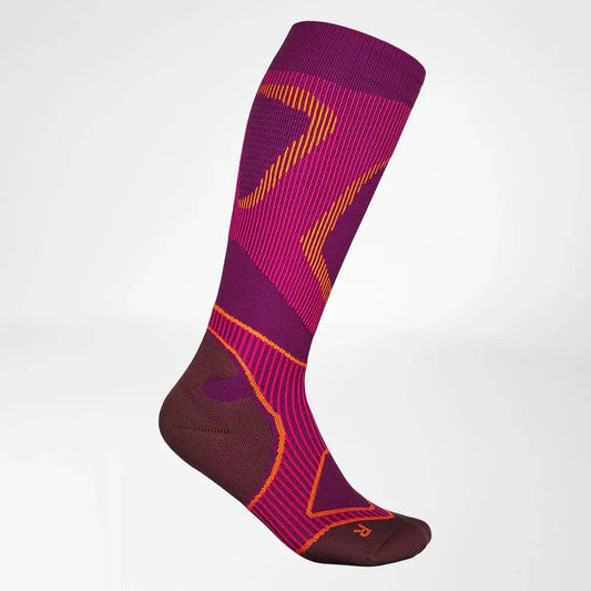 Full-length performance socks in maroon with orange and yellow zigzag accents.