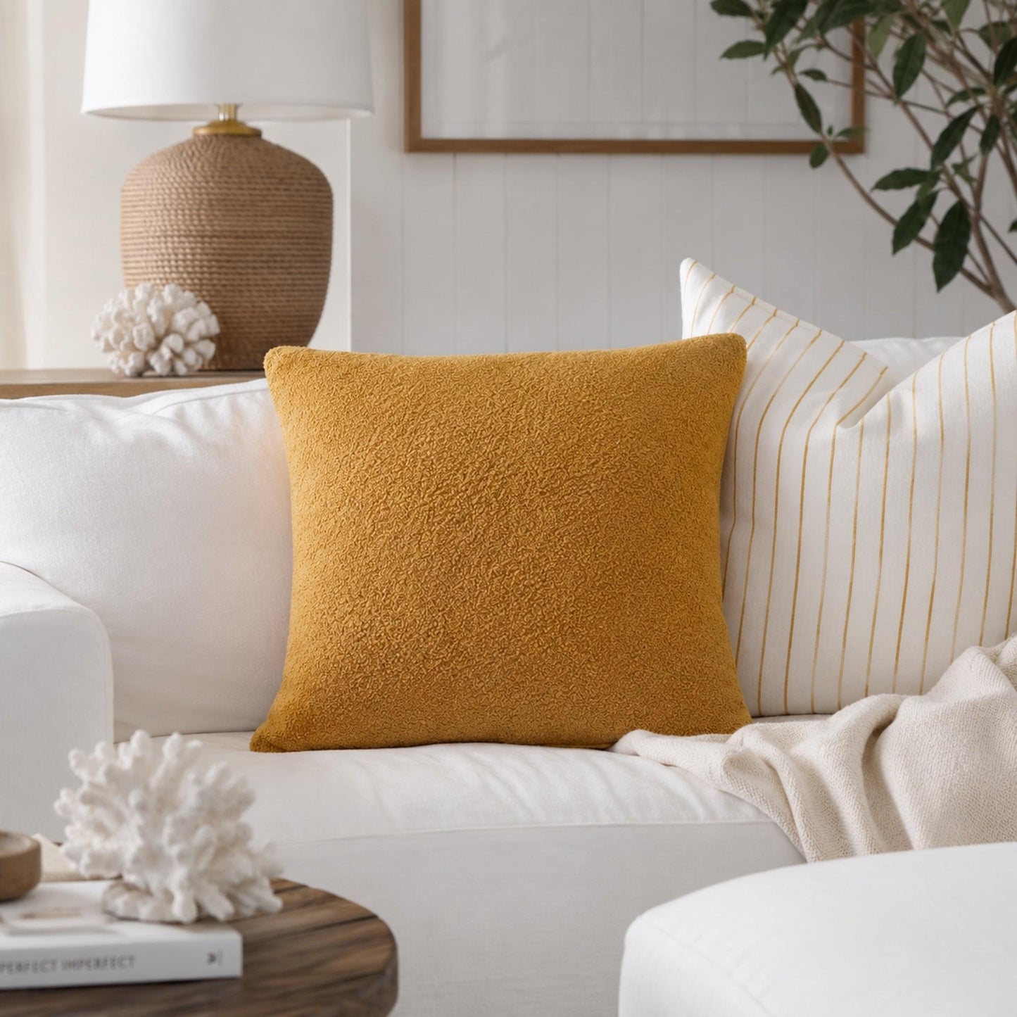 Mustard boucle teddy cushion cover on sofa, square pillow with textured fabric