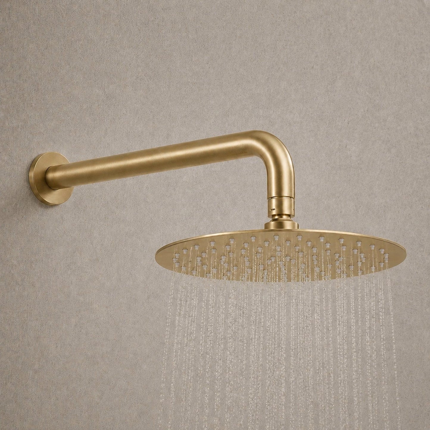 Brushed brass round rainfall shower head with water spray