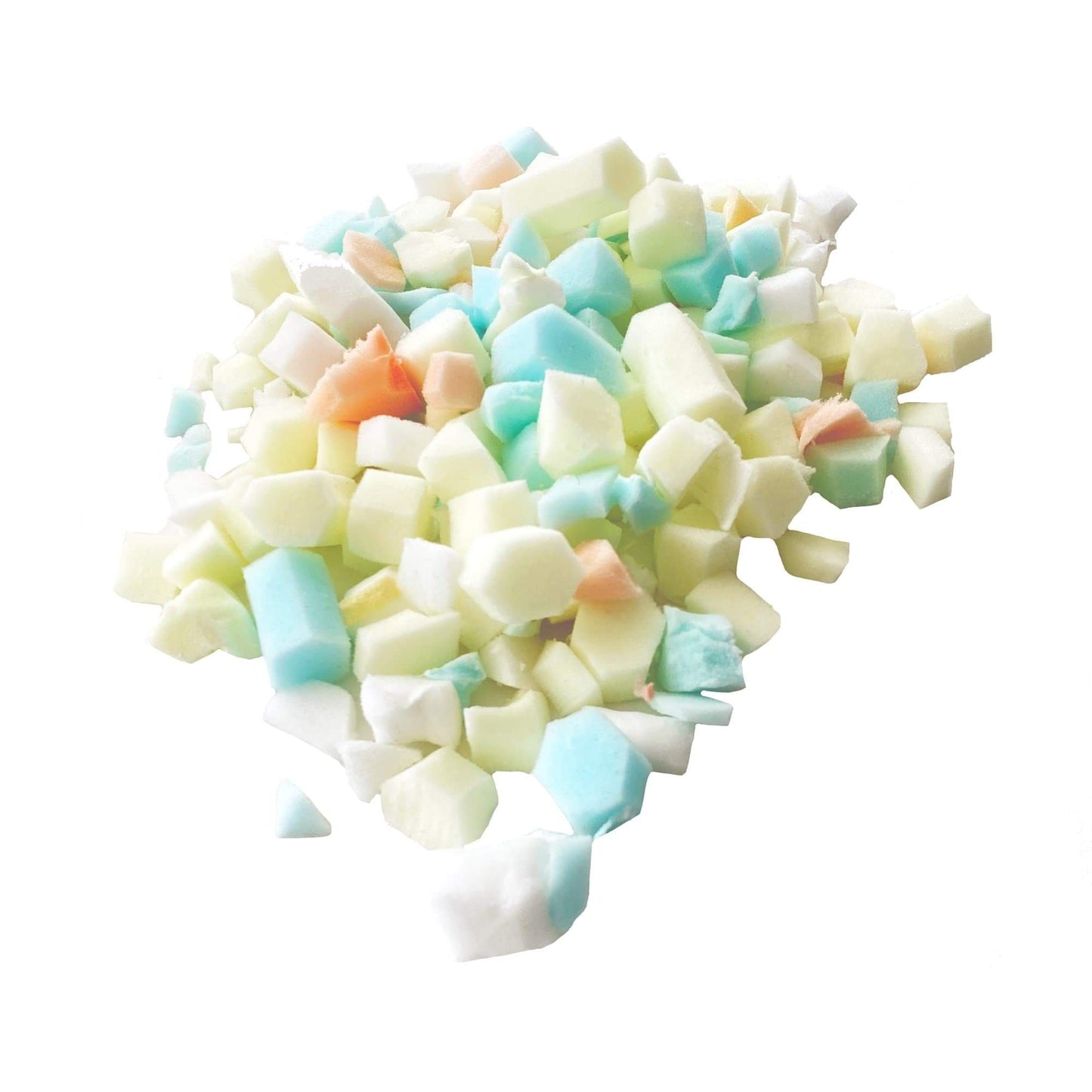 Small pile of pastel shredded foam cubes in mint, yellow, and peach tones