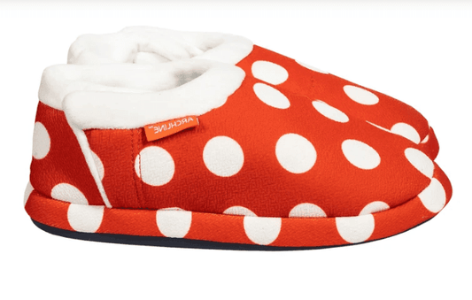 Red closed-toe slipper with white polka dots, white cuff lining, and dark rubber sole