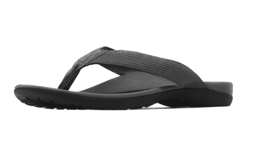 Grey women’s flip flops with wide thong strap and molded sole, side view
