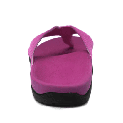 Pink flip-flops rear view, cushioned footbed and black heel sole