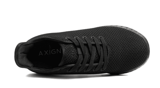 Black lace-up sneaker with textured mesh upper and cushioned collar, side view