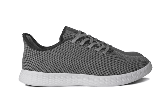 Grey mesh lace-up orthotic sneakers with black collar and white cushioned sole