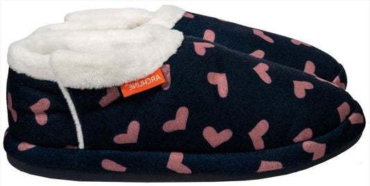 Navy slip-on slippers with pink hearts, plush cuffs, and orange brand label