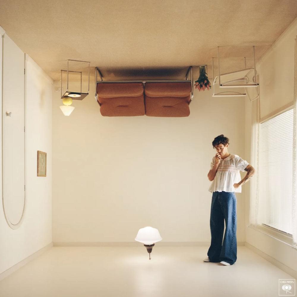 Vinyl album cover showing a man singing in a white shirt and blue pants