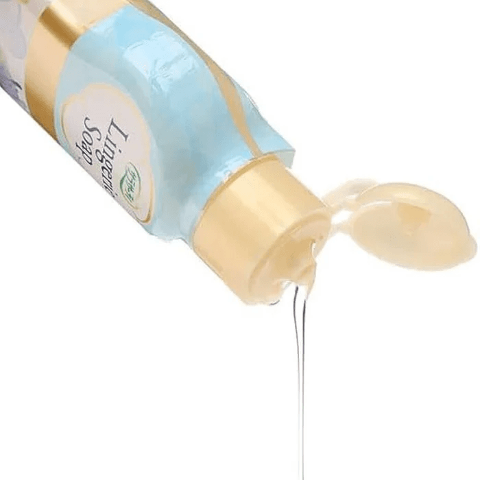 Lingerie soap bottle close-up with nozzle releasing pale liquid