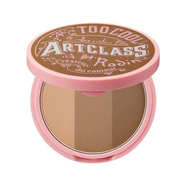 Pink round compact with two-tone bronzer shades and 'Artclass' label on lid