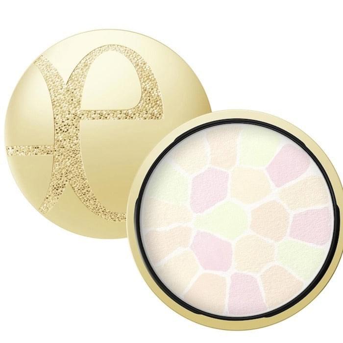 Face powder compact with pastel mosaic pan, pale peach, pink, and cream shades