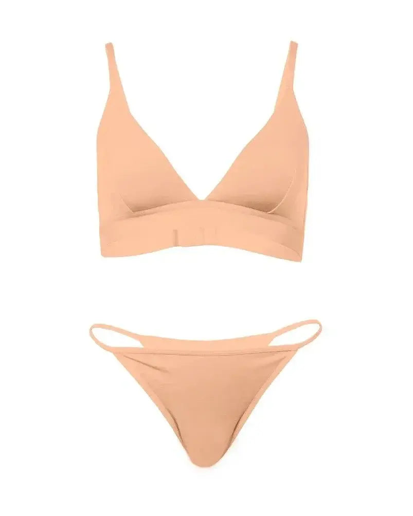 Bone g-string thong, flat lay view with narrow side straps and high-cut back