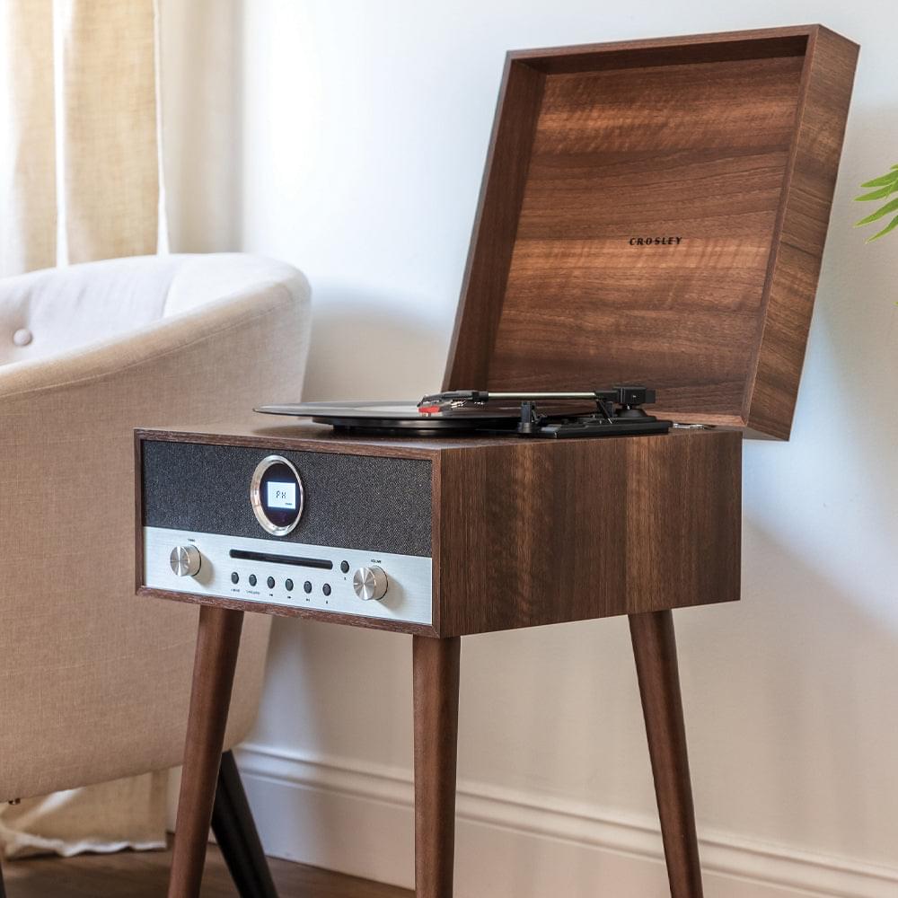 Walnut vinyl record player with open lid, gray control panel and turntable on wooden legs
