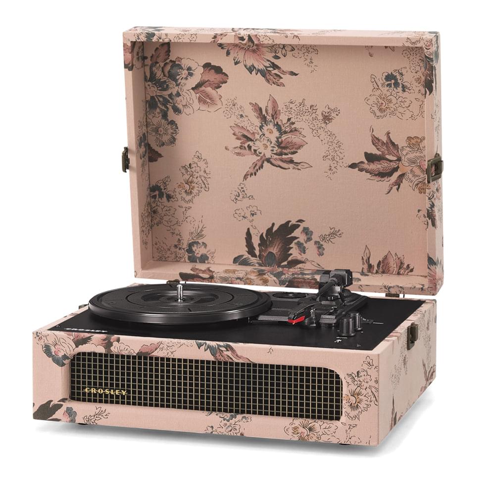 Floral portable turntable with closed lid and vinyl record on platter