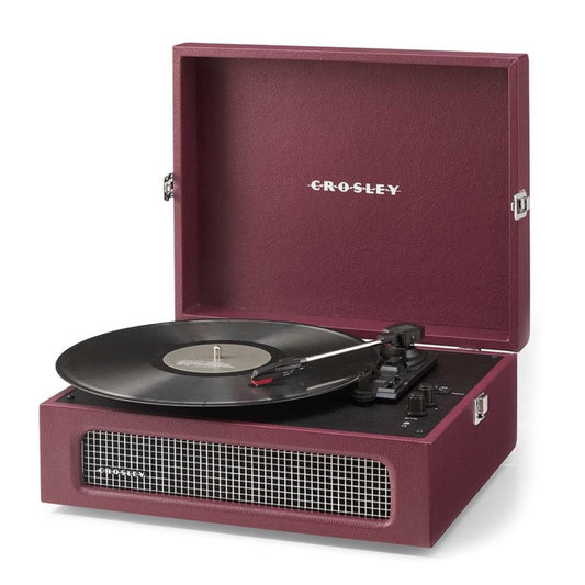 Burgundy portable Bluetooth turntable with open lid, record on platter, speaker grille