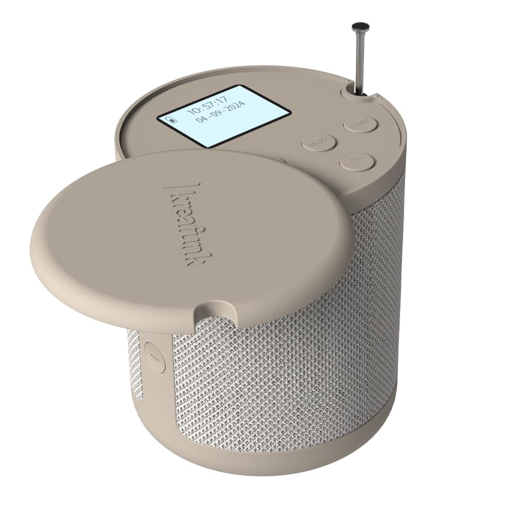 Ivory DAB+/FM radio speaker with LCD screen, telescopic antenna, and fabric grille