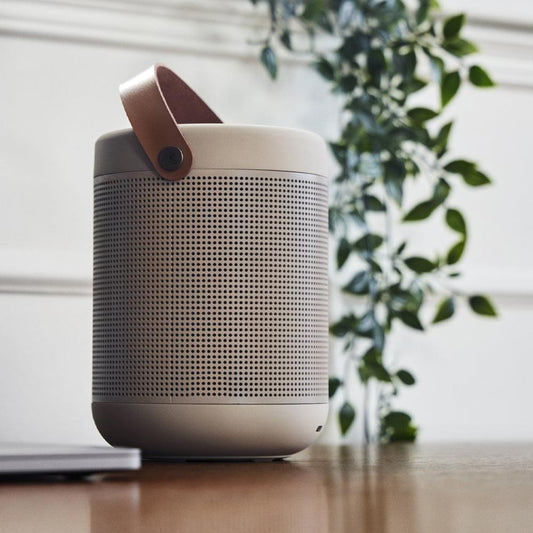 Kreafunk Amajor 2 Bluetooth speaker in ivory sand with brown carry strap