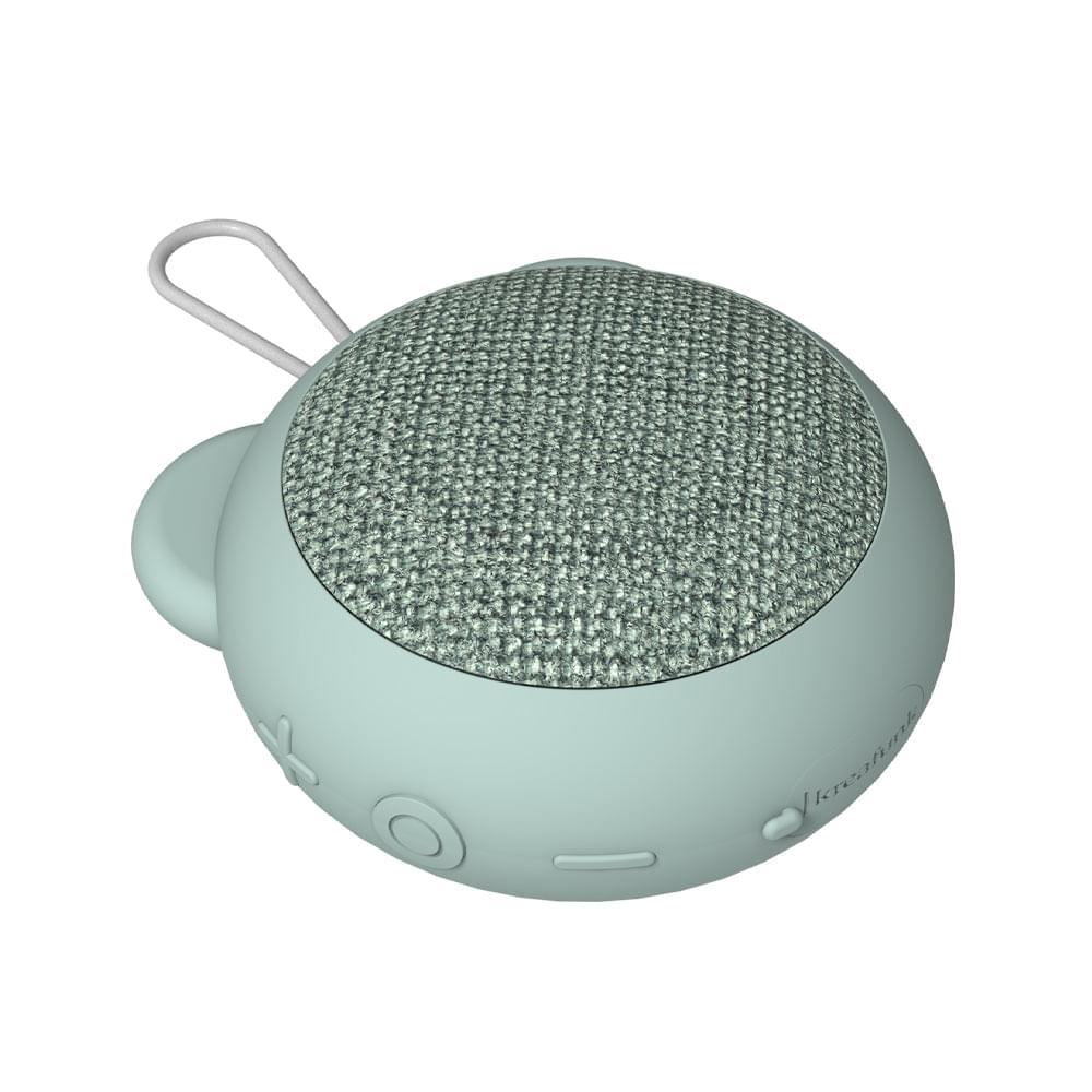 Dusty green portable Bluetooth speaker with oval fabric grille and side buttons
