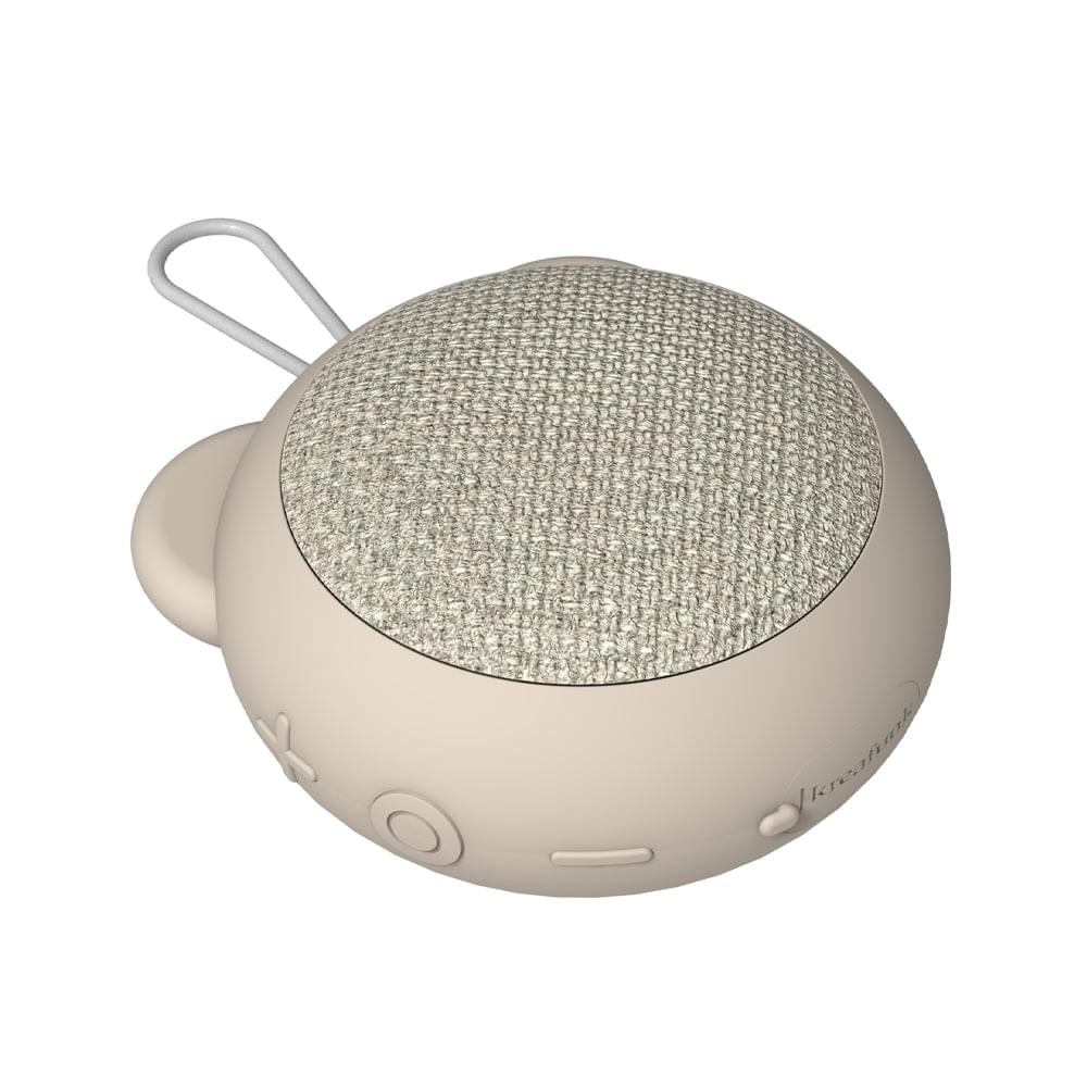 Ivory bear-ear Bluetooth speaker, fabric grille, side control buttons, carrying loop.