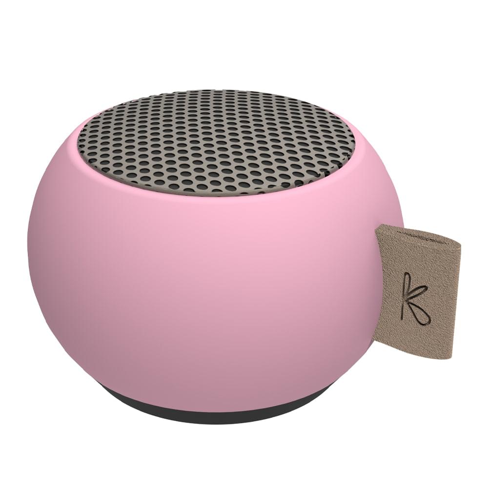 Pink mini Bluetooth speaker with top speaker mesh and beige attachment tag