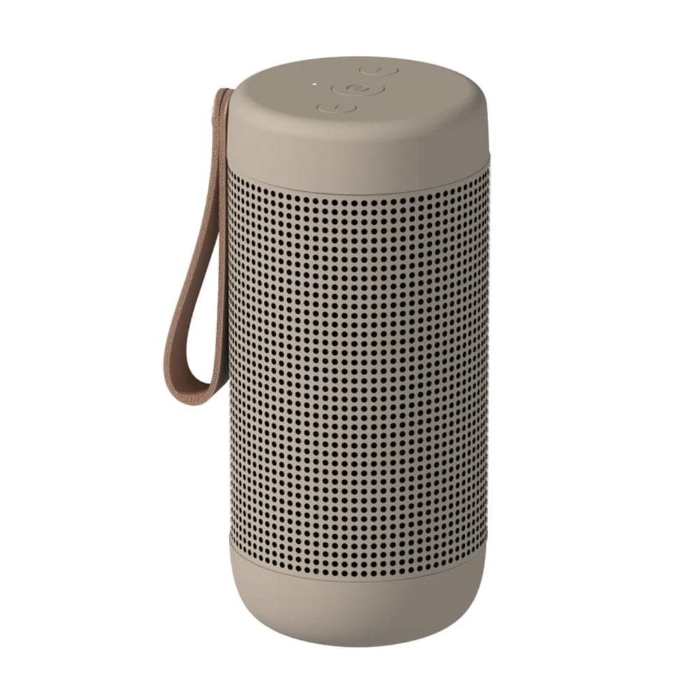 Ivory sand Bluetooth speaker with top controls, perforated grille, and wrist strap