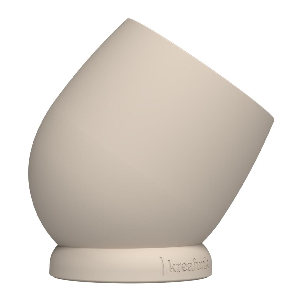 Kreafunk bell alarm clock in ivory sand, side view with curved body and base.