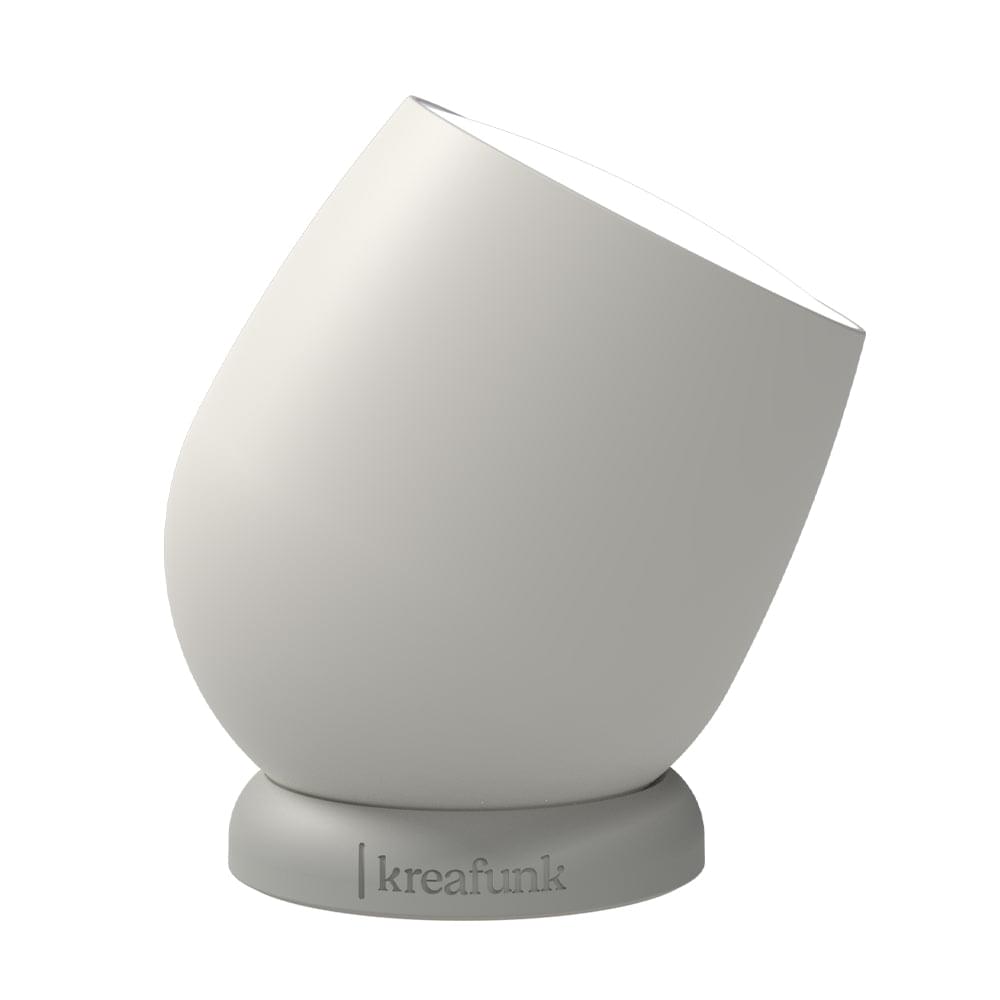 Kreafunk Beam portable lamp, white teardrop silhouette with circular opening