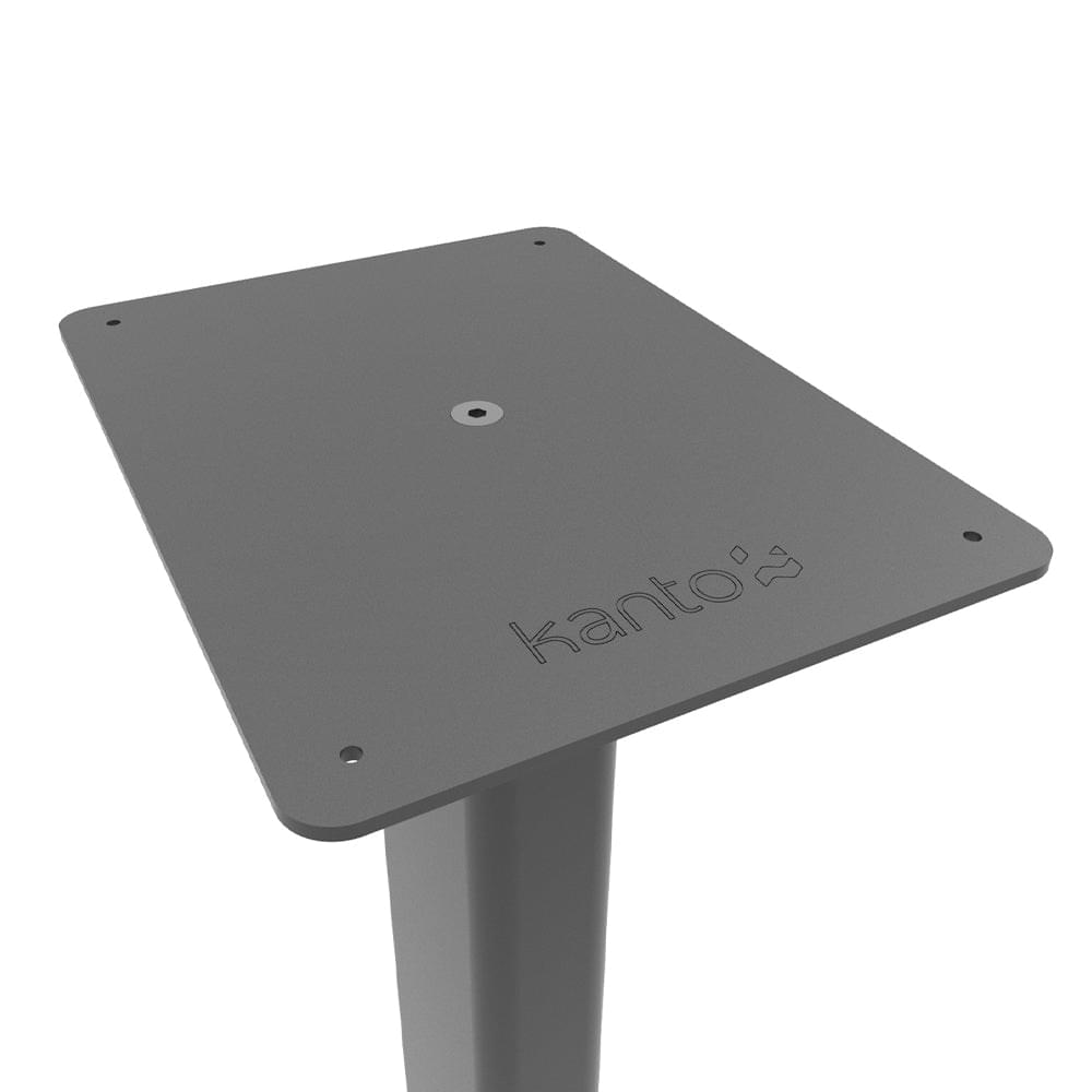 Black top plate of Kanto speaker floor stand with mounting holes and logo