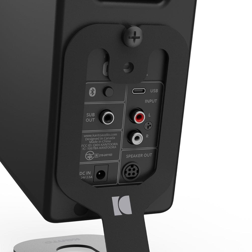 Kanto SU2 rear-mounted stand port panel with USB and audio outputs, black rear view