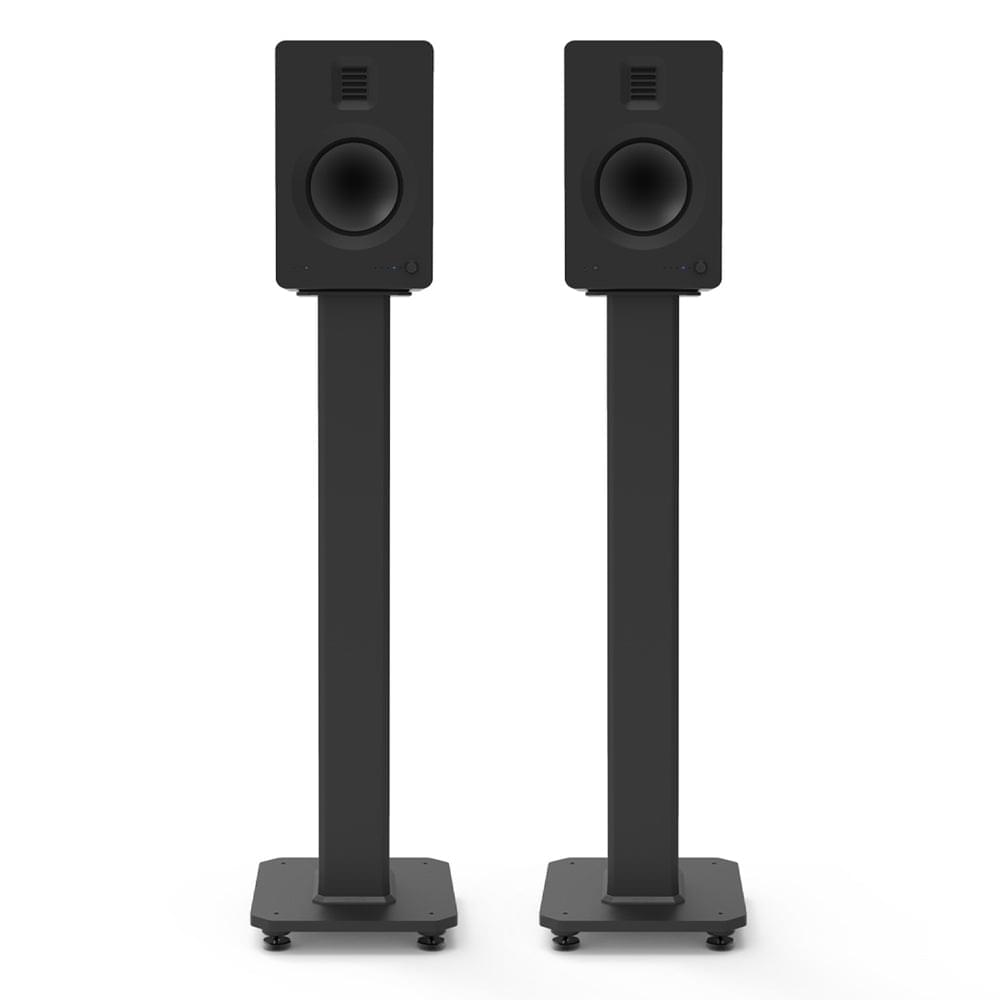 Pair of black speaker stands with isolation feet holding small black speakers