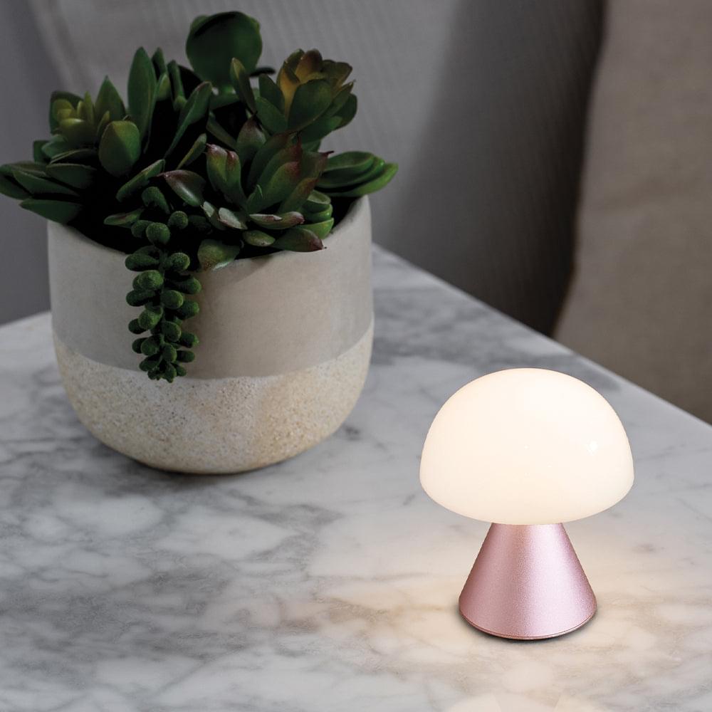 Pink mini LED table lamp with white dome top and rose metal base