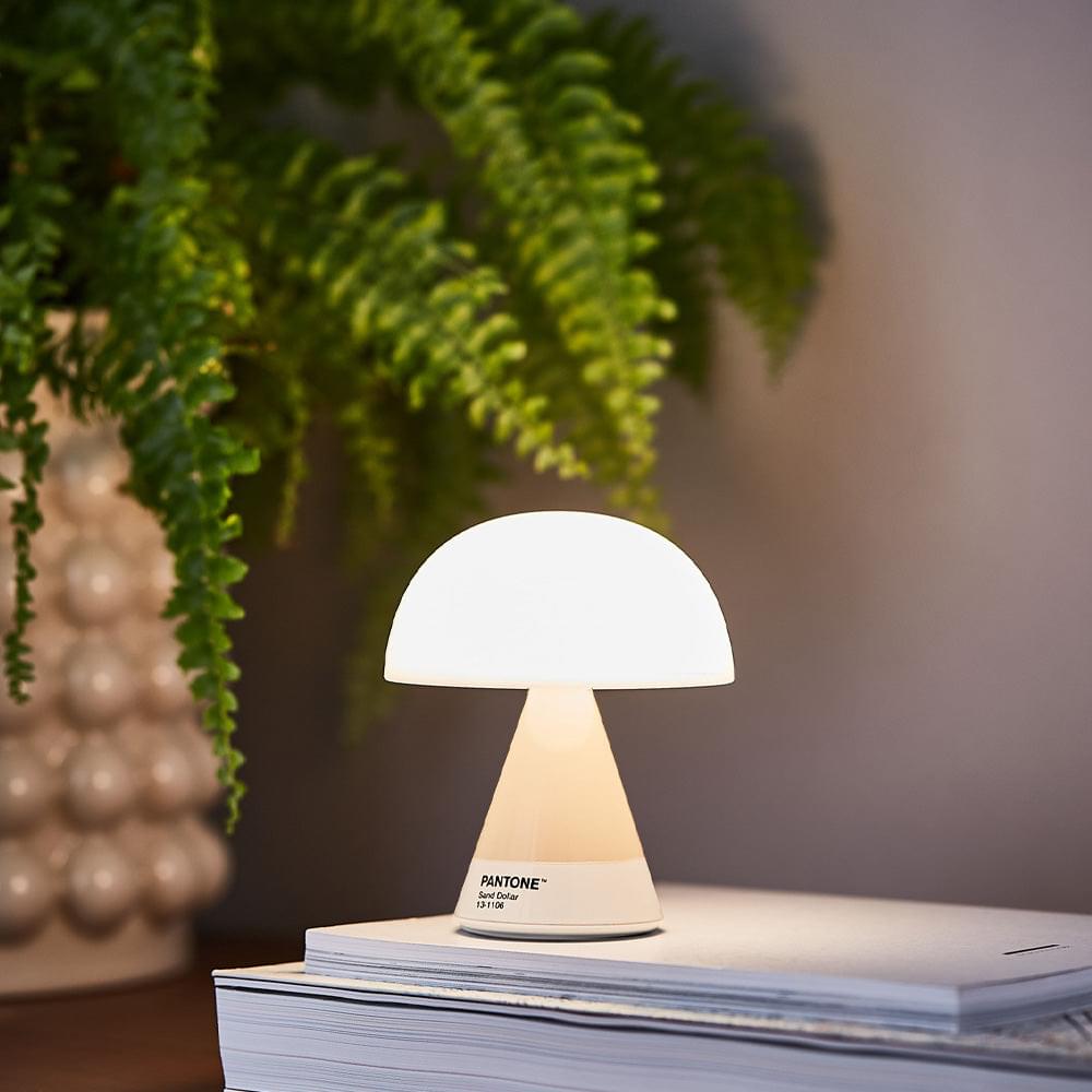 Portable LED table lamp with dome shade and hourglass base, Sand color.