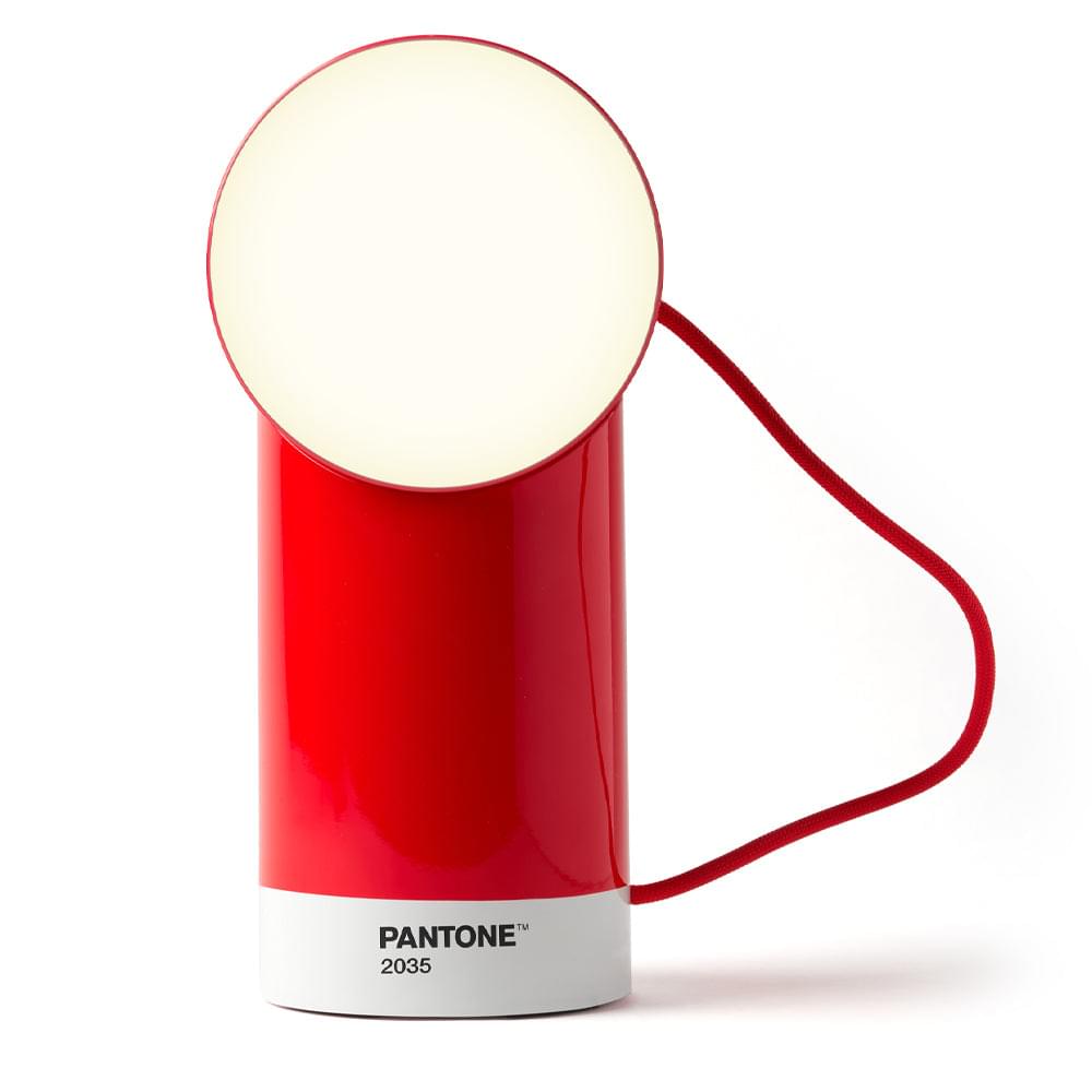 Lexon Orbe portable LED lamp, red cylinder with top round diffuser and red power cord.