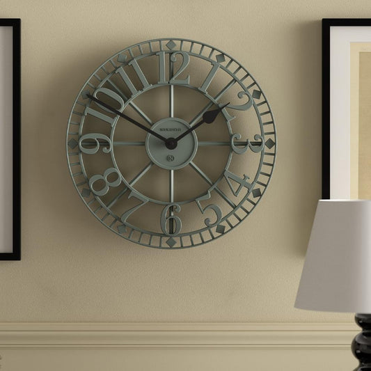 Asparagus green wall clock featuring Roman numerals and scroll-style clock hands