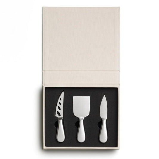 Open beige cheese tool set box with three stainless steel cheese tools