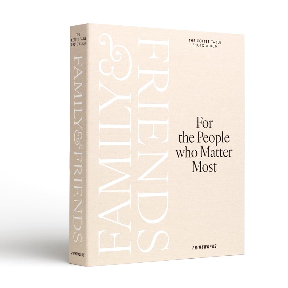 Beige photo album with front cover and vertical white FAMILY & FRIENDS lettering on spine.